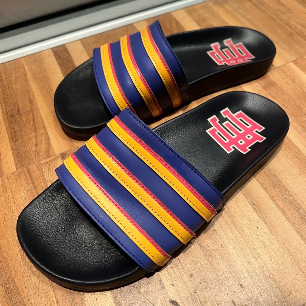 Eric Emanuel x Adidas Adilette Legion Ink / Sonic Ink - Sonic Gold - blue slides